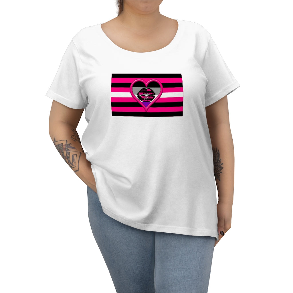 A curvy model in blue jeans and tattoos wearing a white tee with the Asexual Queer Femme Pride flag t-shirt. The femme pride flag has pink/black/white stripes with a black kiss mark in the center with a pink heart around a pink and black striped version of the femme lips, and the black grey purple asexual flag inside. lgbtqai+ lgbtq, demi, plus size tee 2x 3x 4x 5x