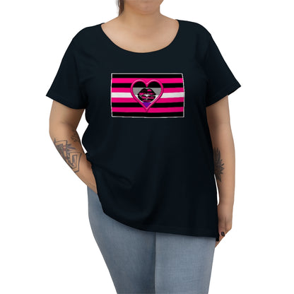 A curvy model in blue jeans and tattoos wearing the Asexual Queer Femme Pride flag t-shirt. The femme pride flag has pink/black/white stripes with a black kiss mark in the center with a pink heart around a pink and black striped version of the femme lips, and the black grey purple asexual flag inside. lgbtqai+ lgbtq, demi, plus size tee 2x 3x 4x 5x